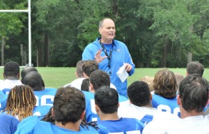 University of West Florida football coach Pete Shinnick talks to the Argonauts after the team's scrimmage. (Photo by Ken Garner | SSRN)