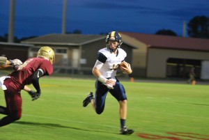 Gulf Breeze's Tyler Phelps makes a move past Northview's Hunter Edwards in the first quarter of the game against Northview. (Photo by Mat Pellegrino | SSRN)