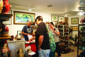Visitors peruse Holley Hill Pottery’s gift shop. Holley Hill Pottery is one of many stops on the Beaches to Woodlands tour. (Photo by Romi White | South Santa Rosa News)