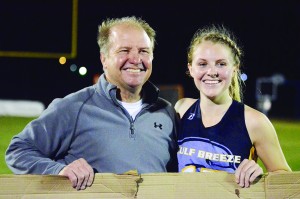 After scoring her 100th goal of her career, Frances Williams joined her father, Jack Williams, on the sidelines for a photo opp.  (Photo by Christian Graves | South Santa Rosa News)