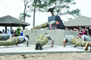 Marine Raider Memorial March ruckers do a series of pushups before the start of their 770-mile journey. (Photo by Mat Pellegrino | South Santa Rosa News)