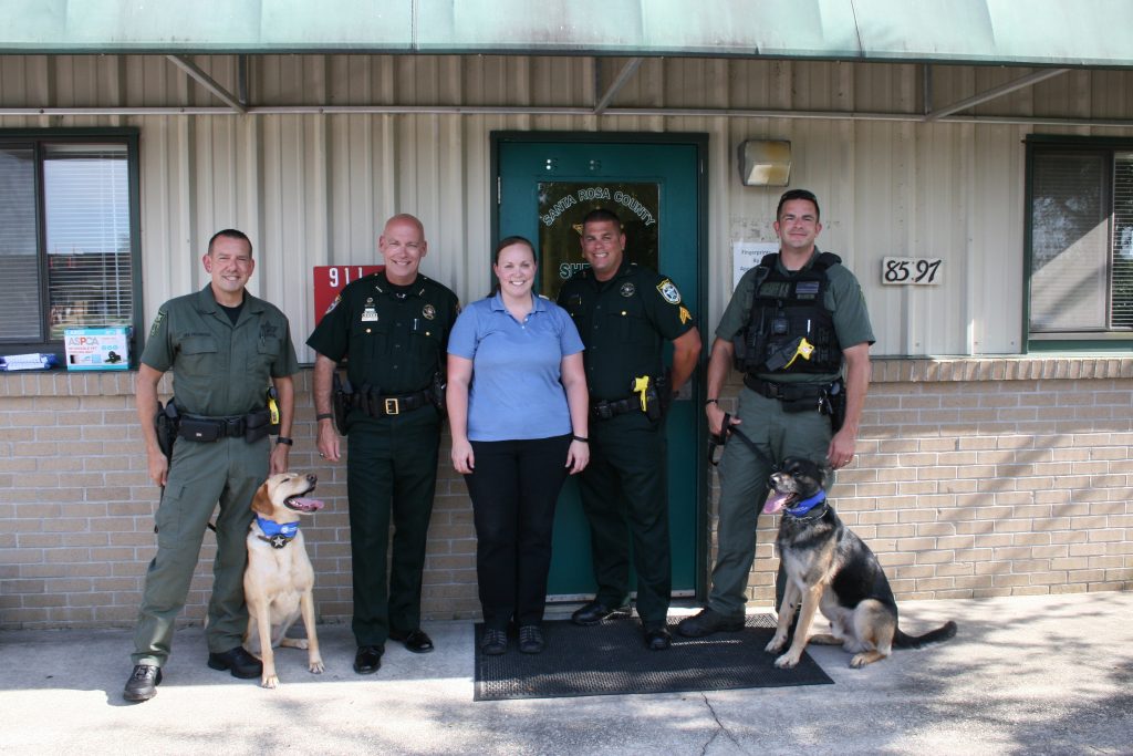 Navarre dog lover makes "cool" donation to police K9 units South
